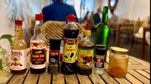Sauces on the table   at Sacred Lotus Cafe in Phnom Penh