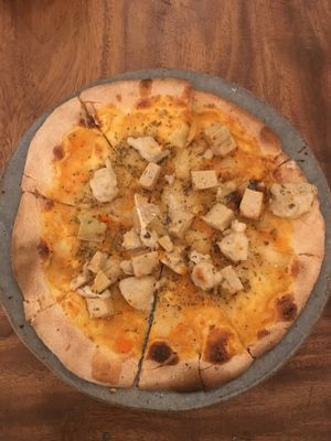 Vegan meat feast pizza at Sacred Lotus Cafe in Phnom Penh