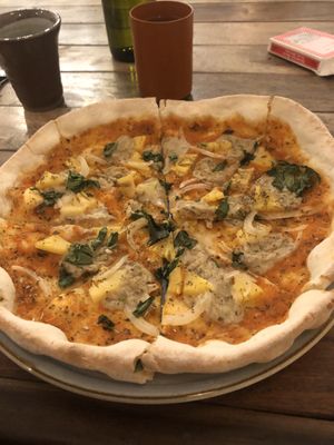 Pineapple pizza at Sacred Lotus Cafe in Phnom Penh