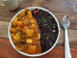 Red curry with tofu and brown rice - more, than amazing😍 And the portion was huge at Sacred Lotus Cafe in Phnom Penh