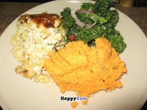Macaroni and vegan cheese, carrot salad, and kale salad at Woodlands Vegan Bistro, Washington, DC at NuVegan in Washington
