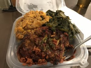 Eggplant Parm, greens and yams at NuVegan in Washington