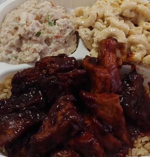 Vegan chicken and tuna macaroni salad sides. BBQ tofu with rice at NuVegan in Washington