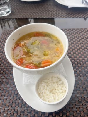 Vegetable soup with rice (vegan, but very oily)  at Terrassa in Khiva