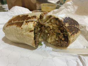 Santo burrito (soy scramble, hash brows, seitan asada, peppers)  at Maya Ophelia's in Milwaukee