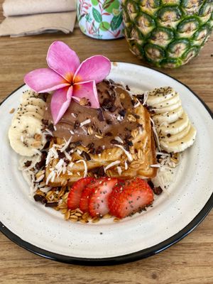 Off-menu dessert - seashell waffle with fresh fruit, granola, and homemade chocolate ice cream. at Tropical Kitchen Cabo in Cabo San Lucas