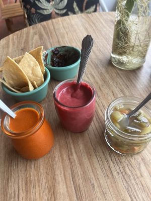 Pepper salsa, hibiscus salsa, and jalapeños  at Tropical Kitchen Cabo in Cabo San Lucas