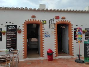 Outside at Barril Beach Cafe in Faro