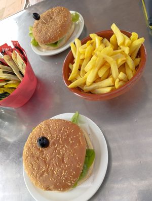 Chips to share and 1 soya burger and 1 carrot and seaweed burger. at Barril Beach Cafe in Faro