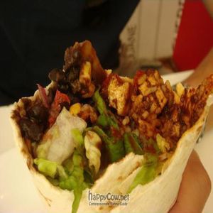 Roasted Corn, Mole Tofu, Black Beans, and Fajita Veggies. I think that's about it. It costs 4.70 euros! at Dolores in Berlin