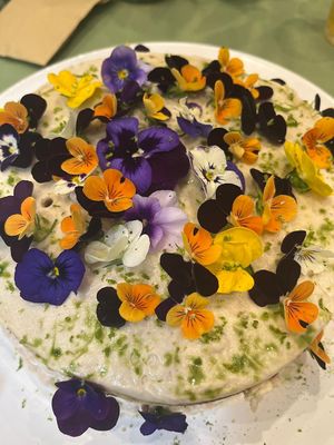 Torta de Limon cubierta de Flores comestibles, semillas y frutos secos   at Eco Tienda Café in Asuncion