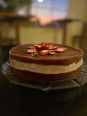 “Torta de Frutilla y frutos secos” rellena con crema de macadamia y frutillas   at Eco Tienda Café in Asuncion
