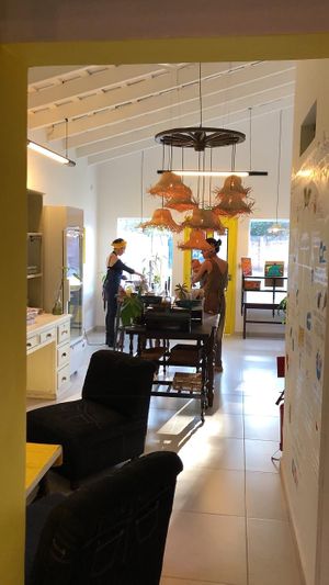 The lights you see hanging there, represent the daily job farmers do for us to have natural and nutritional foods in our tables. Thank you!!! at Eco Tienda Café in Asuncion