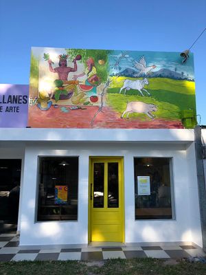 The yellow door is the entrance! at Eco Tienda Café in Asuncion
