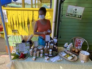 The manager of the market and her natural cosmetic stall   at Farmers' Market in Puerto Viejo De Talamanca