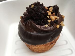Chocolate cronut muffin with chocolate cream and brownie on top (vegan!) at Chök in Barcelona