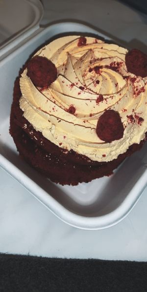 Small cake with passion fruit topping and raspberry jam filling  at Chök in Barcelona