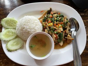 Stir-fried vegetables, mushrooms, tofu and holy basil with white rice, 50 baht  at CMU Vegan - Kinphak Cafe in Chiang Mai