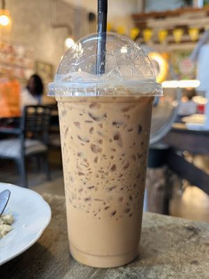 Coconut milk w/ coffee, ice (40 THB)  at CMU Vegan - Kinphak Cafe in Chiang Mai