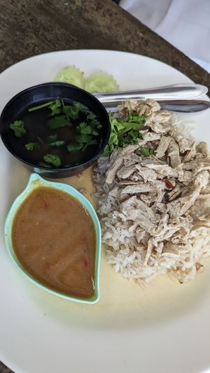 Vegan chicken and rice with hot sauce at CMU Vegan - Kinphak Cafe in Chiang Mai