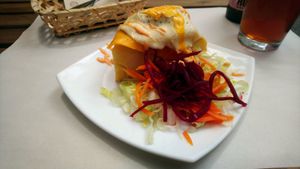 Tortilla de patatas with bacon and egg at Veganitessen in Sevilla