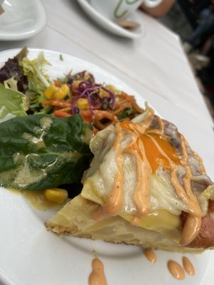 Vegan tortilla with vegan fried egg, bacon and cheese  at Veganitessen in Sevilla