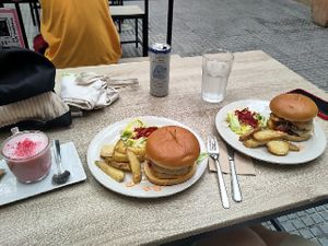 Double bacon & egg burgers with Pink latte at Veganitessen in Sevilla