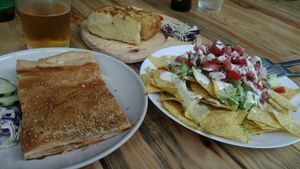 Empanada pisto, nachos y tortilla at Veganitessen in Sevilla