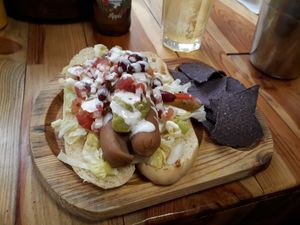 Double hot dog with guacamole and salsa. at Veganitessen in Sevilla