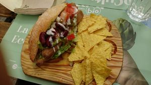 Hot dog + guacamole + sour cream at Veganitessen in Sevilla