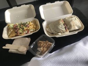 Burrito + nachos and guacamole + tres leches cake  at Veganitessen in Sevilla