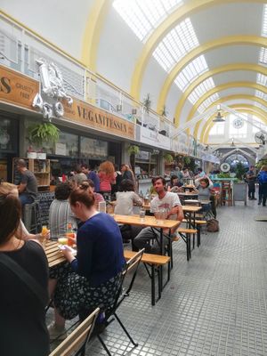 Covered outdoor seating at Veganitessen in Sevilla