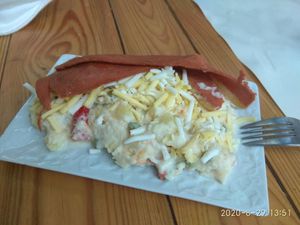 Ensaladilla with extra cheese and bacon at Veganitessen in Sevilla