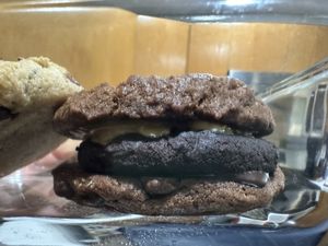 PB chocolate cookie sandwich  at For Goodness Cakes - Food Truck in Baiting Hollow