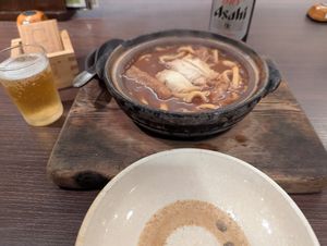 the base miso nikomi udon on my most recent visit along with an asahi super dry at Yamamotoya in Nagoya