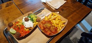 Vegan curry wurst and fries with 3 sauces + falafel at Frittenwerk - Kaiserstraße in Frankfurt