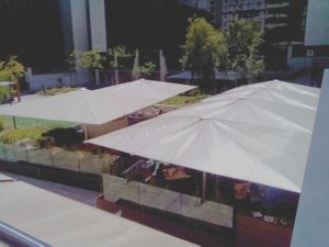 Lounge bar with outdoors sofas and tables at Enigma D'Alquimia in Lisbon