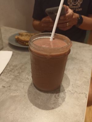 Yoga smoothie: pinneappe, strawberry, banana, wheatgrass, coconut or almond milk at Organica - Town Center in Panama City
