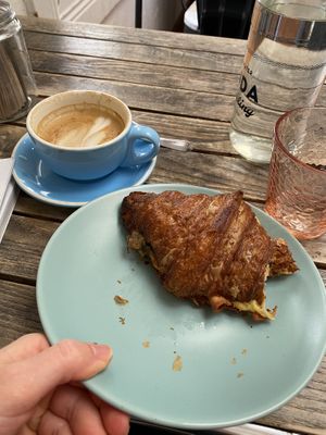 Soy coffee and cheesy croissant with added ham 👌🏻   at Oh My Days in Glebe