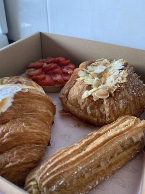 Lemon meringue croissant, strawberry tart, almond croissant and hazelnut eclair   at Oh My Days in Glebe