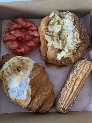 Lemon meringue croissant, strawberry tart, almond croissant and hazelnut eclair   at Oh My Days in Glebe