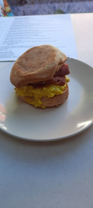 Scrambled tofu fake bacon in bun at Oh My Days in Glebe