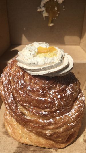Vegan croffin with mango and macadamia cream filling   at Oh My Days in Glebe