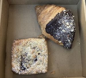 Delicious & tasty chocolate croissant with amazing gooey chocolate filling + yummy cherry Danish  …  We LOOOOVED these 😋  at Oh My Days in Glebe