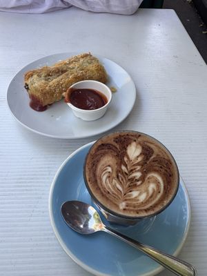 Mocha and “pork” n fennel sausage roll   at Oh My Days in Glebe