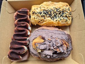Tiramisu croissant $11: delicious; Choc orange peanut croissant $12.50: amazing choc shell, +orange cream filling, peanut swirl doesnt go well; Sausage roll $8.5: yum at Oh My Days in Glebe