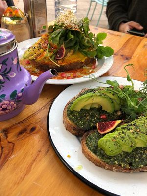 Avocado on toast and hummas and avocado on toast (with strawberries, pomegranate, pea shoots etc at Mama Carmen's Coffee & Bakery in Mallorca