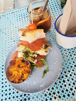 Vegan focaccia and a glass of cold brew at Mama Carmen's Coffee & Bakery in Mallorca