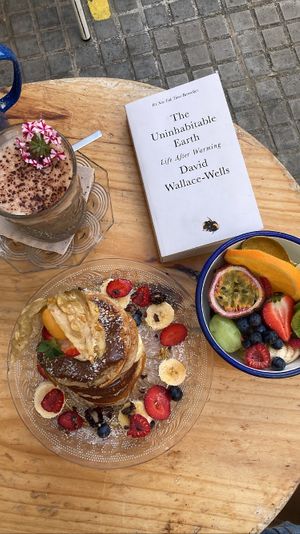 Brunch spread (chai latte, chocolate pancakes, fruit bowl)  at Mama Carmen's Coffee & Bakery in Mallorca