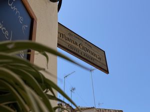 Cafe sign  at Mama Carmen's Coffee & Bakery in Mallorca